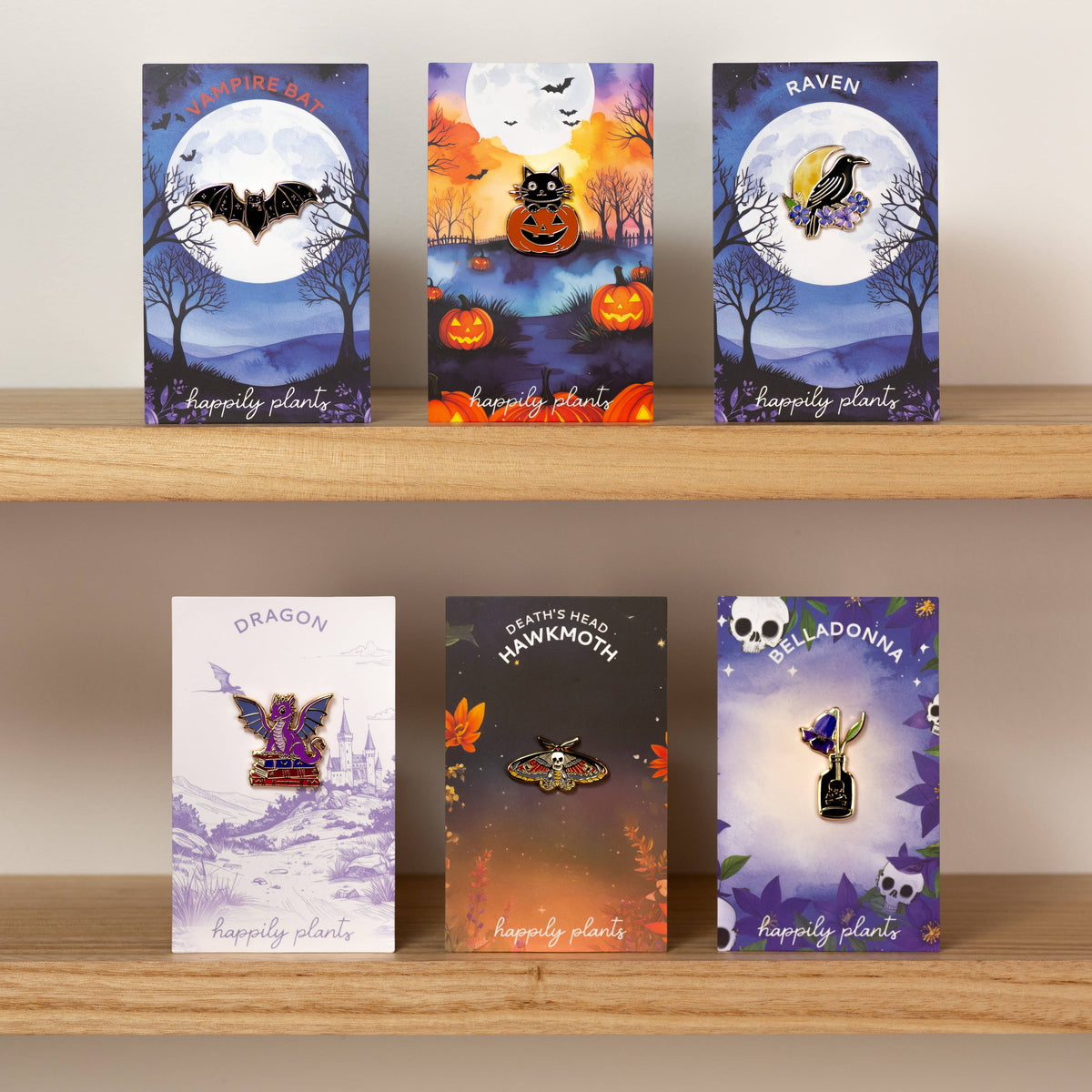 Set of Halloween themed cards featuring a bat, cat, raven, and other characters