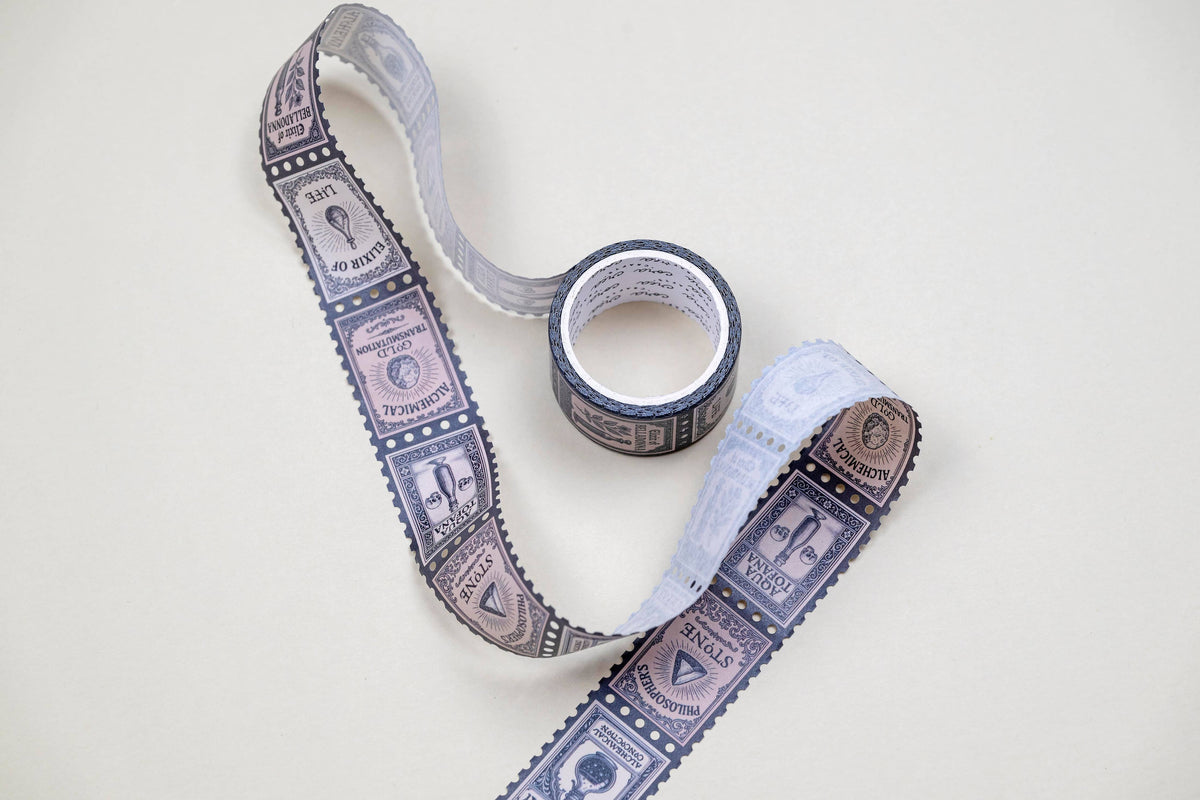 Washi tape with blue stamp and banknote pattern, shown with matching roll