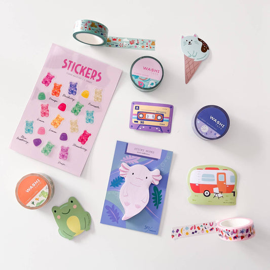 Assorted die-cut sticky notes featuring a pink axolotl sheet, plus sticker tape rolls