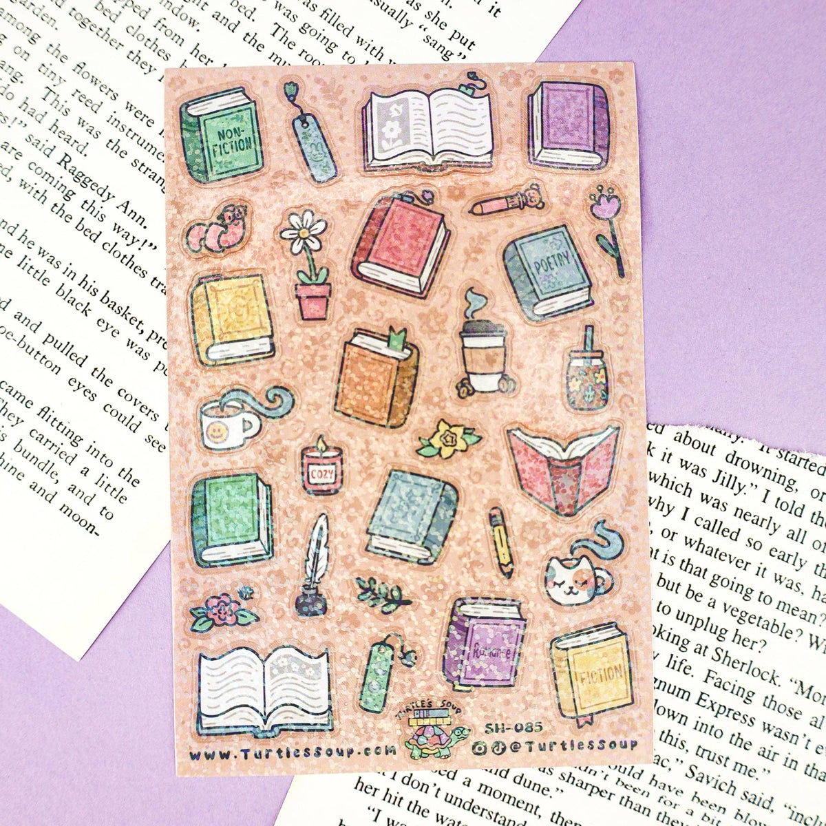 Glitter sticker sheet showing books, stationery, cups, and flowers in pastel art