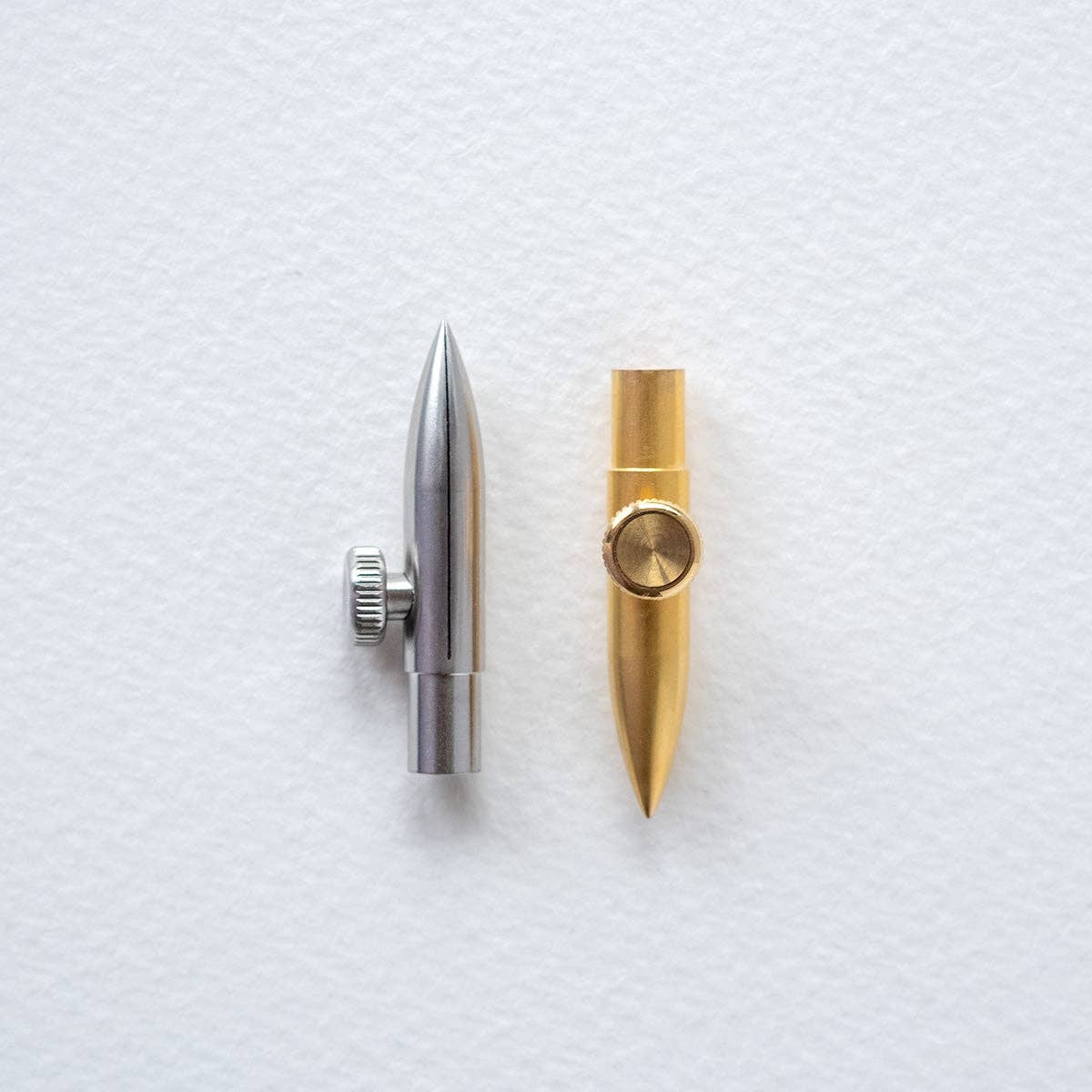 Calligraphy nib set with silver and brass nibs and knurled adjustment wheels