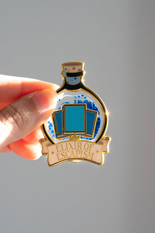 Elixir of Escapism Liquid Glitter Enamel Pin | Bookish Book