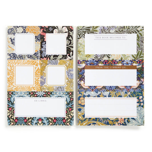 Label book open to pages with multiple blank white label boxes in patterned frames