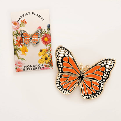 Monarch butterfly pin with product card featuring orange and black wings.