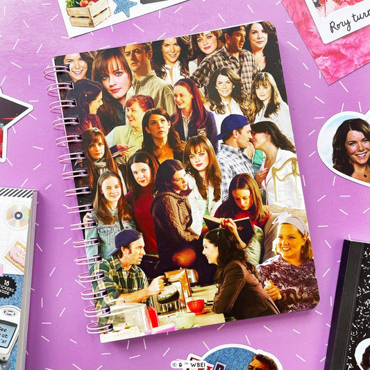 Spiral notebook with Gilmore Girls character collage cover on purple, wire-o binding