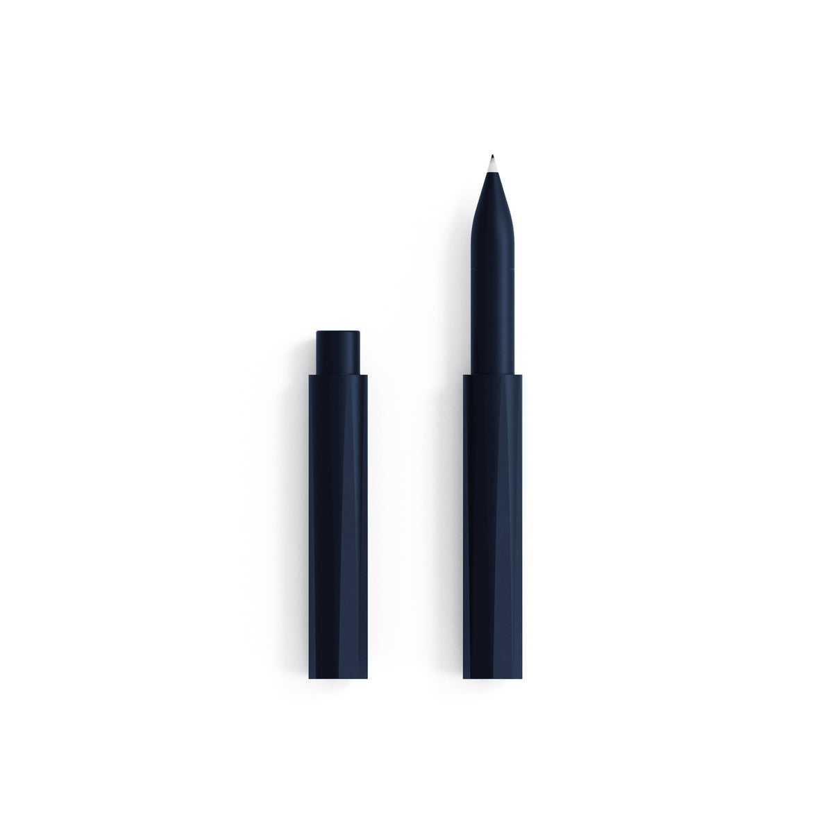 Refillable writing pen, midnight blue body with cap and pointed tip