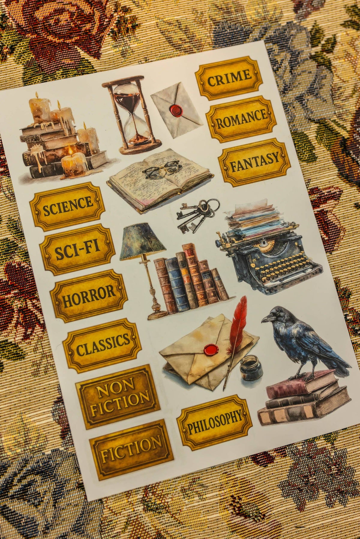 Library sticker sheet with hourglass, books, quill, envelopes, typewriter, and labeled tabs