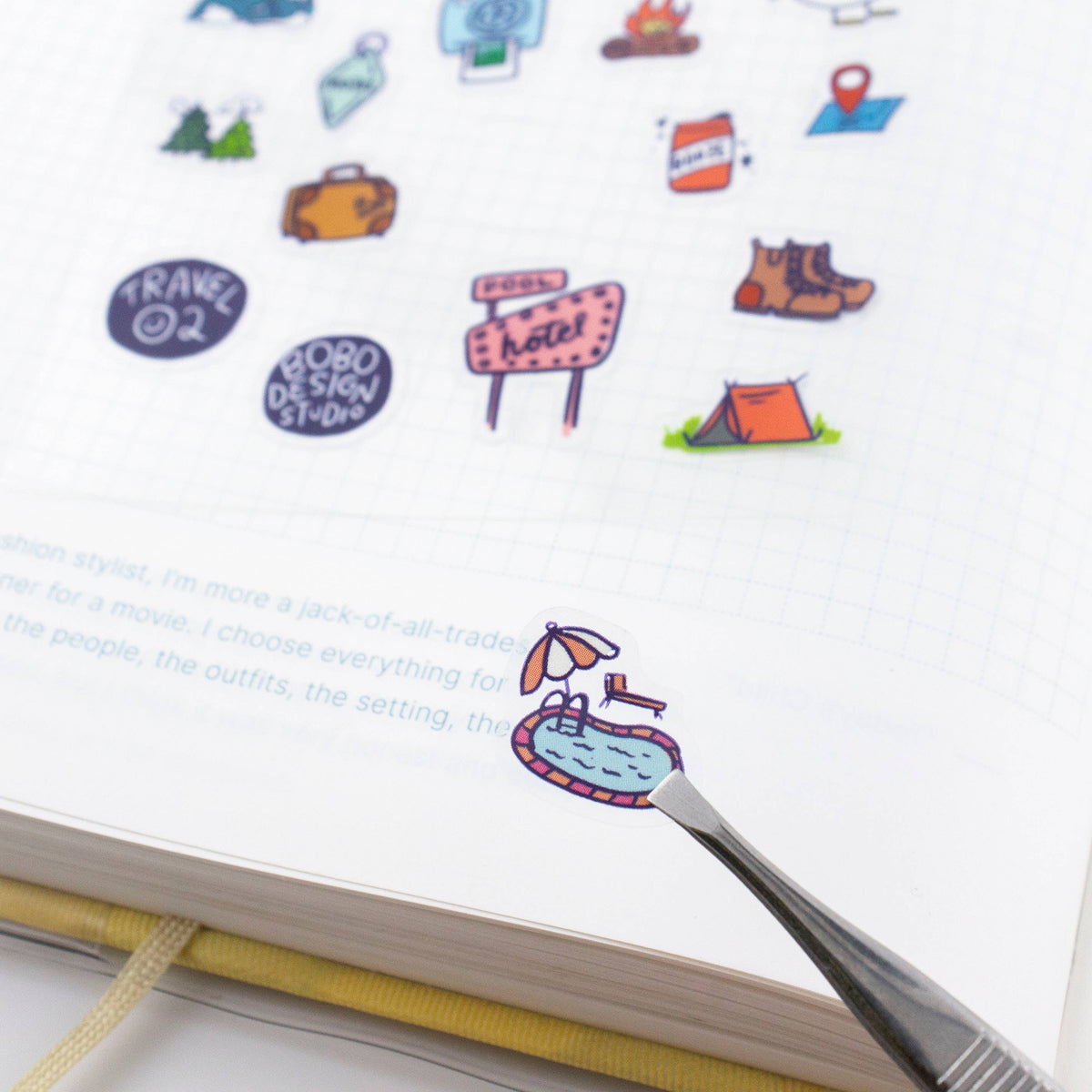 Travel sticker sheet corner with travel badge and notebook by comb tool