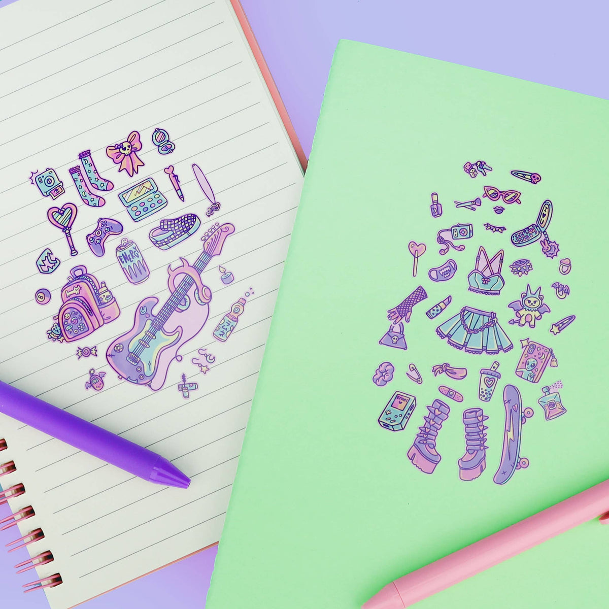 Sticker sheets with purple fashion accessory icons next to notebook and pen