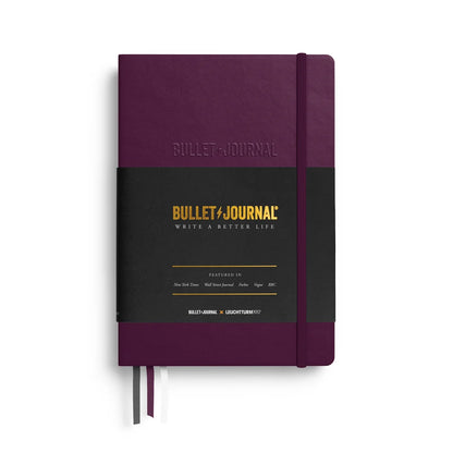 Two-tone purple and black Bullet Journal Edition 2 notebook with elastic bookmark ties