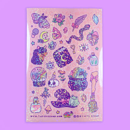 Pastel witch sticker sheet, purple glitter-style icons of eyes, cats, moons, and crystals
