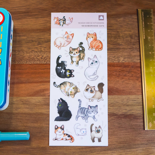 Washi sticker sheet with assorted cartoon cats in black, orange, and white