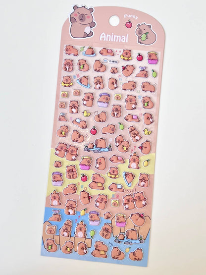 Animal sticker sheet with assorted cartoon animal stickers and capybara character faces