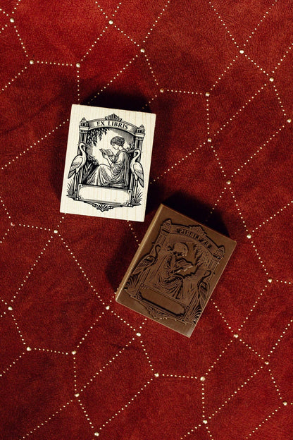 Art Deco wooden Ex Libris stamp with carved figure, shown with matching stamped block