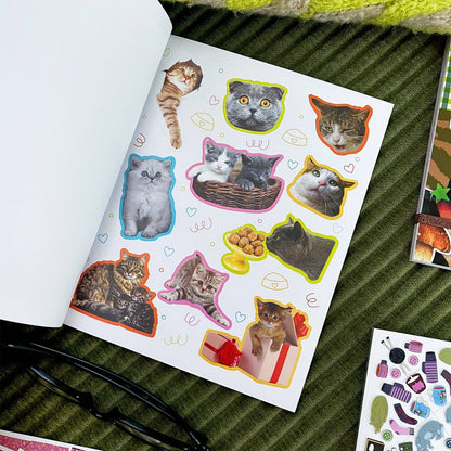 Cat sticker book page with white background and colorful cat stickers with doodles