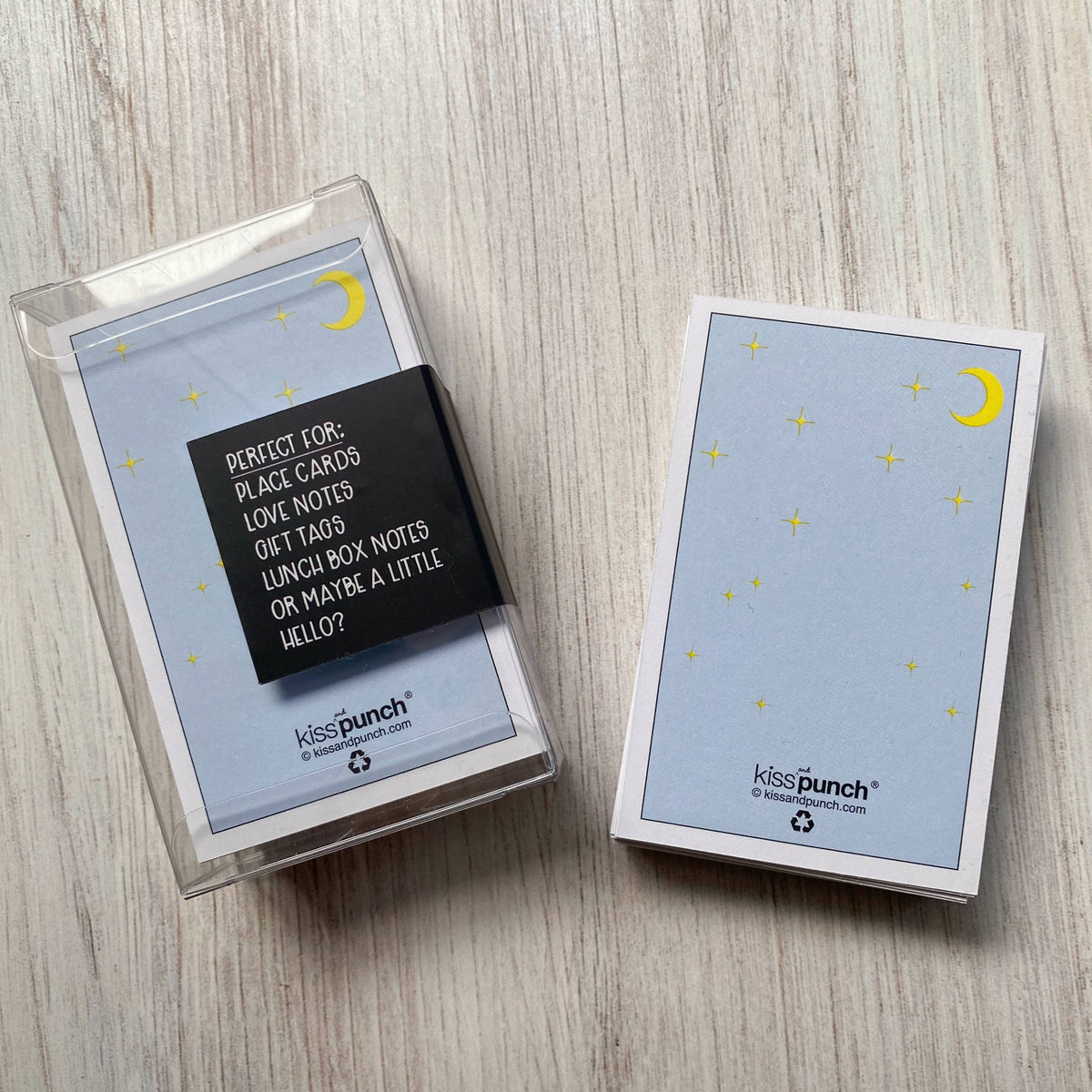 Tarot card mini notecards showing the reverse, with moon and star artwork and Kiss Punch branding.