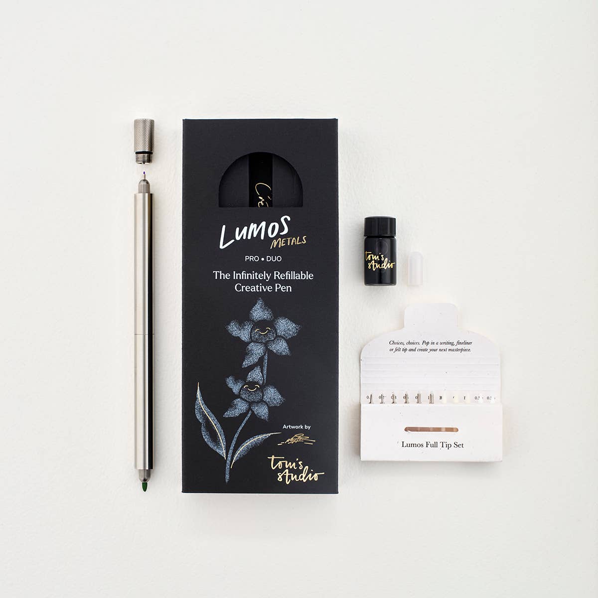Stainless steel fountain pen kit with pen, ink bottle, and tip set card