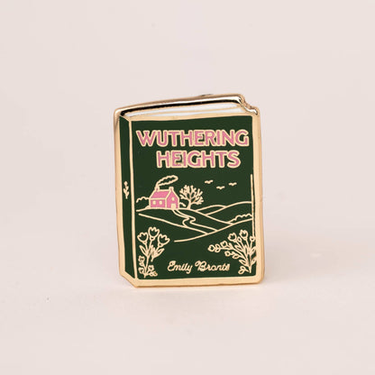 Enamel book pin with green 'Wuthering Heights' cover illustration, gold edge