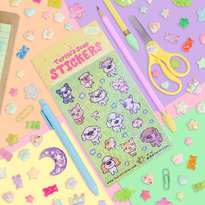 Sticker sheet featuring big-head pets with colorful outlines and craft-stationery around it