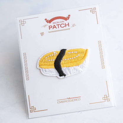 Japanese omelette sushi embroidered iron-on patch on card with yellow topping