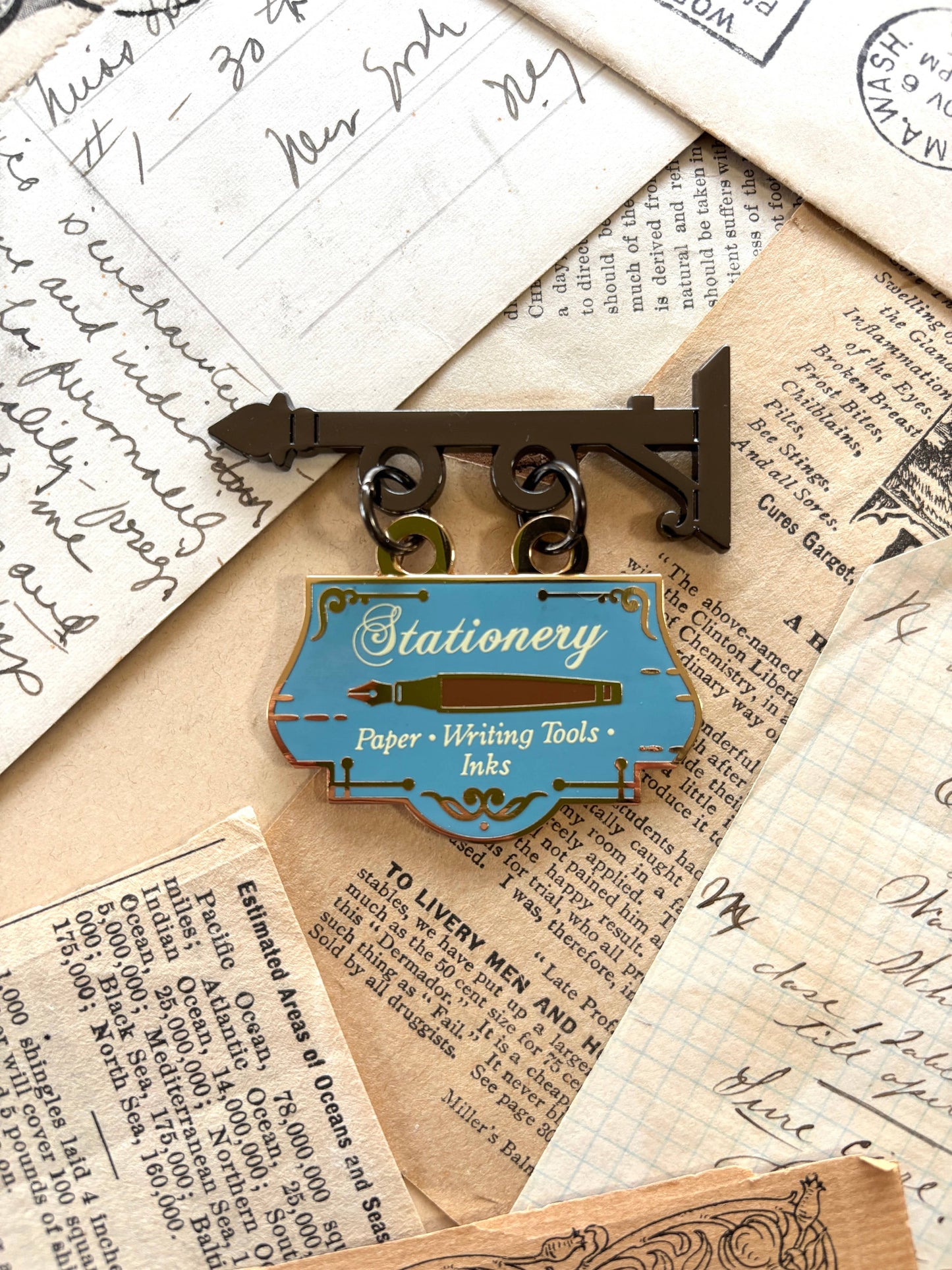 Stationery store shop sign pin