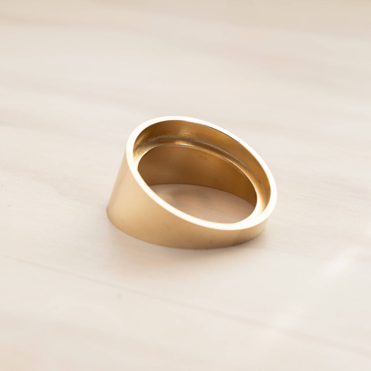 Tilt ink pot holder with gold base and empty inner metal cup opening