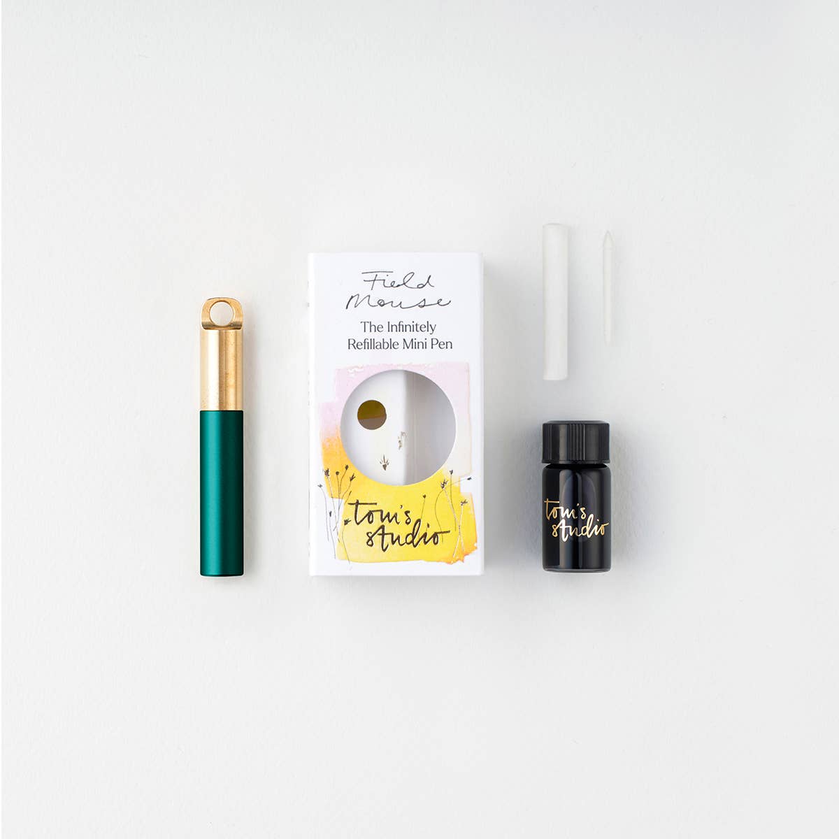 Midnight refillable travel pen kit with box, spare parts, and black ink bottle