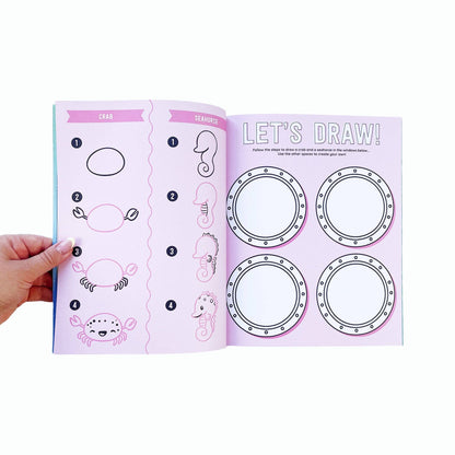 Draw-along sealife sticker book, pink numbered drawing page with sea outlines and frames