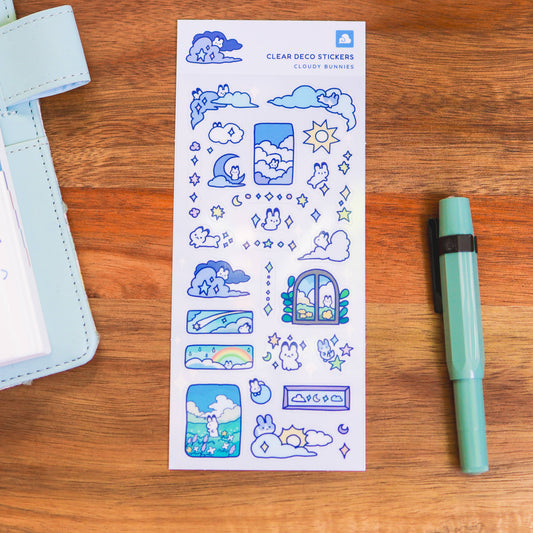 Clear sticker sheet with blue cloudy bunnies, stars, and window-style icons