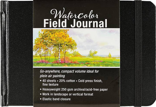 Black watercolor field journal with landscape cover art and elastic band closure