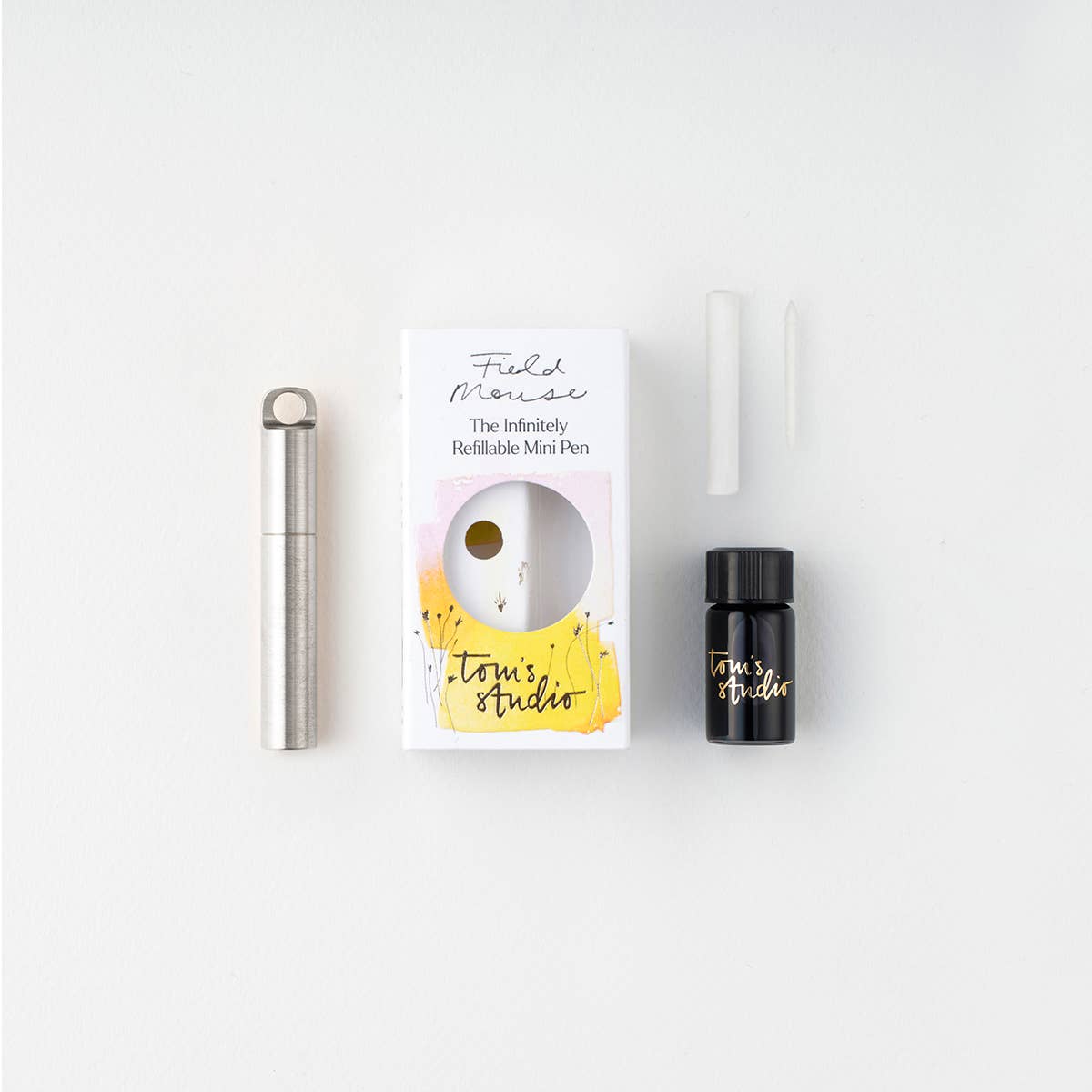 Metallic refillable travel pen kit with box, spare parts, and black ink bottle