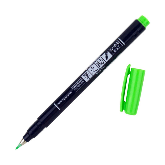 Calligraphy brush pen in green, with green cap and chisel tip