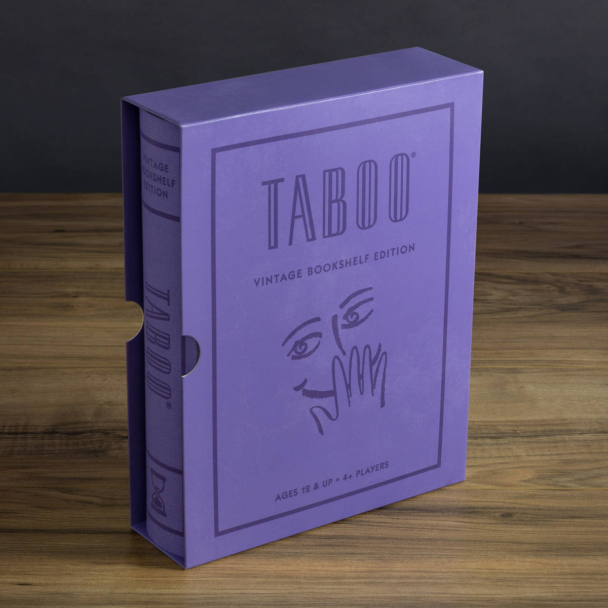 Vintage bookshelf edition game box close-up with bold lettering and abstract face/hand