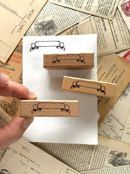 Scroll banner rubber stamp