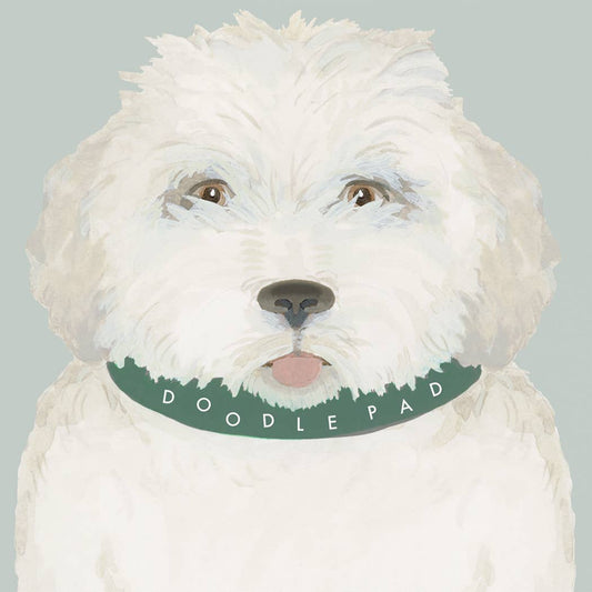 Dog face notepad cover with green "DOODLE PAW" band across the muzzle