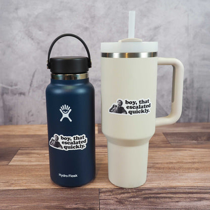 Boy escalated quickly quote sticker on navy bottle and white travel tumbler