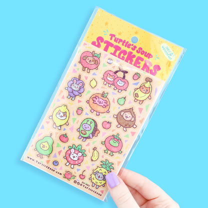 Glitter sticker sheet with cute fruit-animal characters and sparkly effects