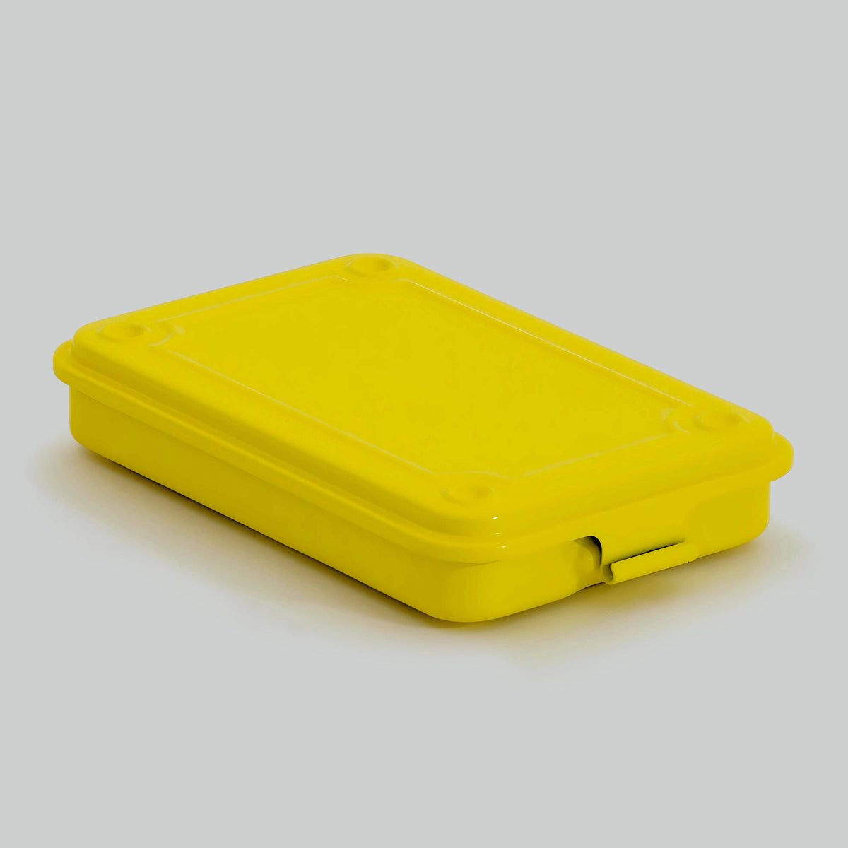Toyo steel stackable storage box in bright yellow, shown closed
