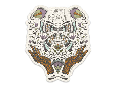 Die-cut vinyl sticker with an ornate butterfly, floral details, and “You Are Brave” lettering.