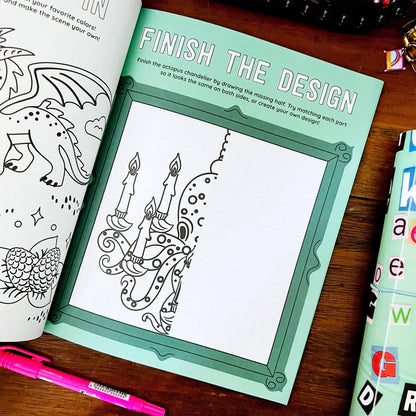 Sticker book 'Finish the Design' page with green frame and candle doodle outline.