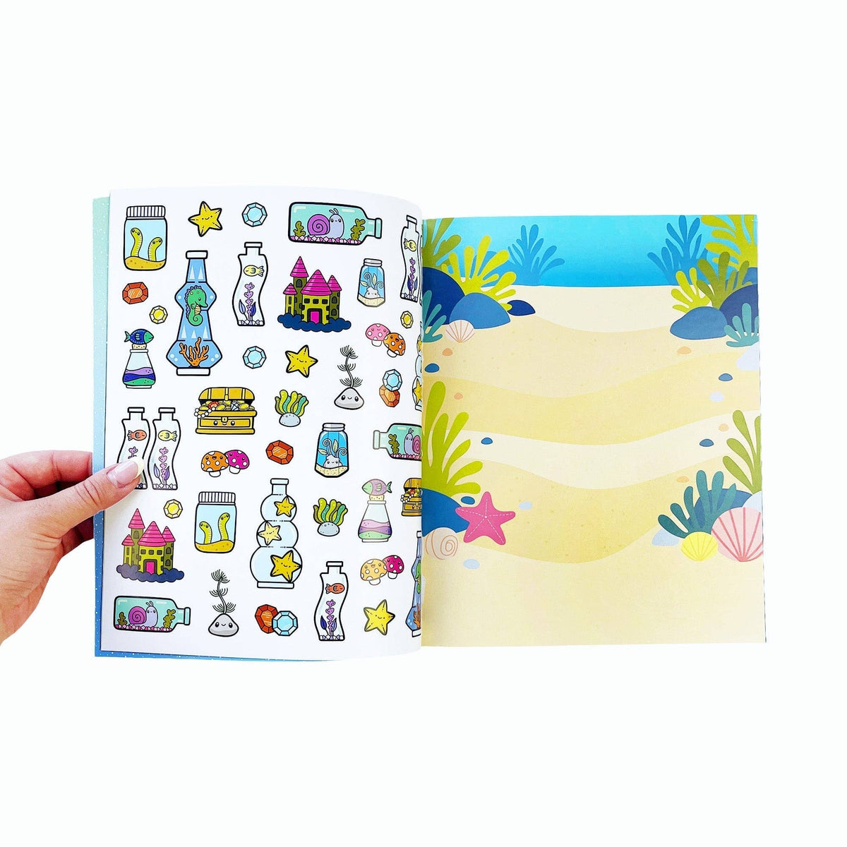 Draw-along sealife sticker book, open spread with sticker sheets on both pages