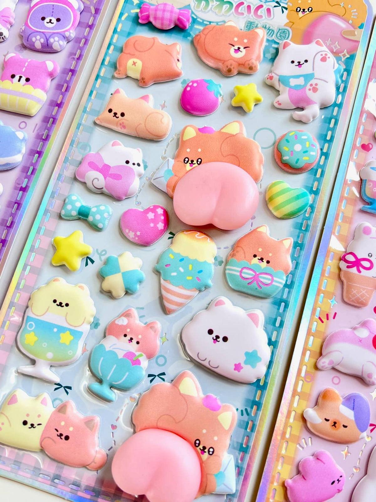 Animal squishy butt sticker sheet in blue with assorted pastel animal and star designs