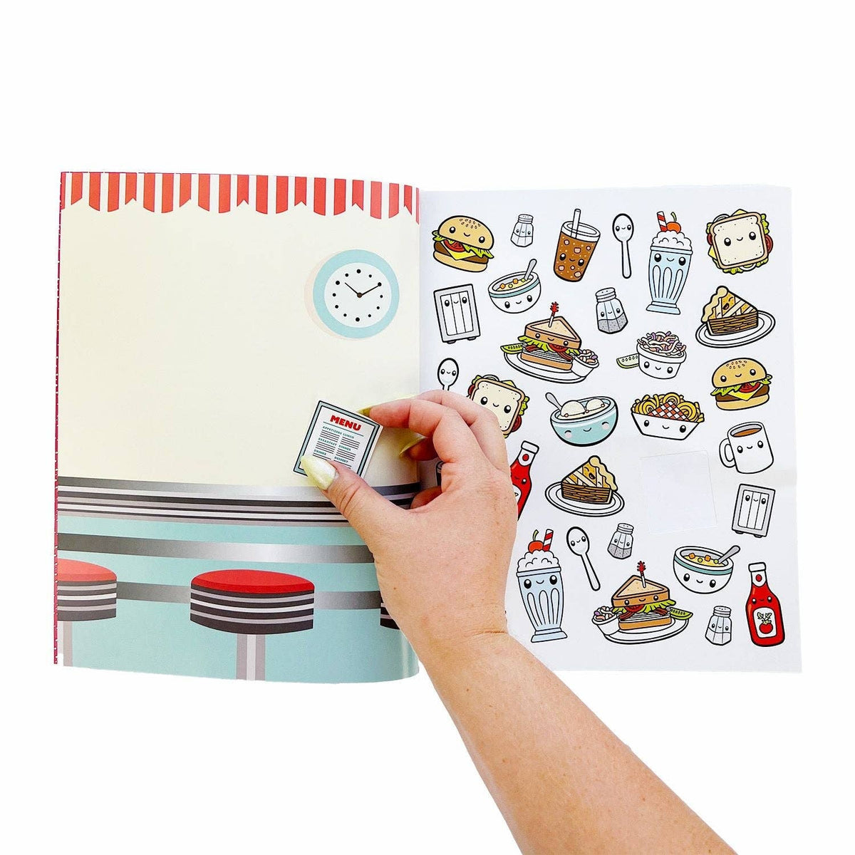 Food sticker book page with food sticker set and a hand peeling a sticker sheet