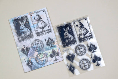 Clear stamp set with rabbit, dress girl, cards, clock, hearts and spade icons