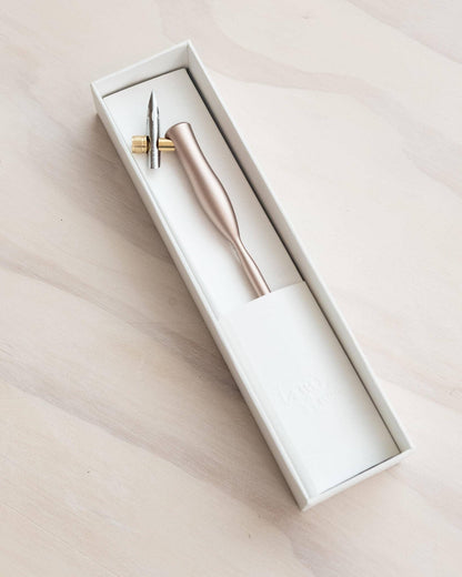 Flourish calligraphy pen in rose-gold finish inside a gift box