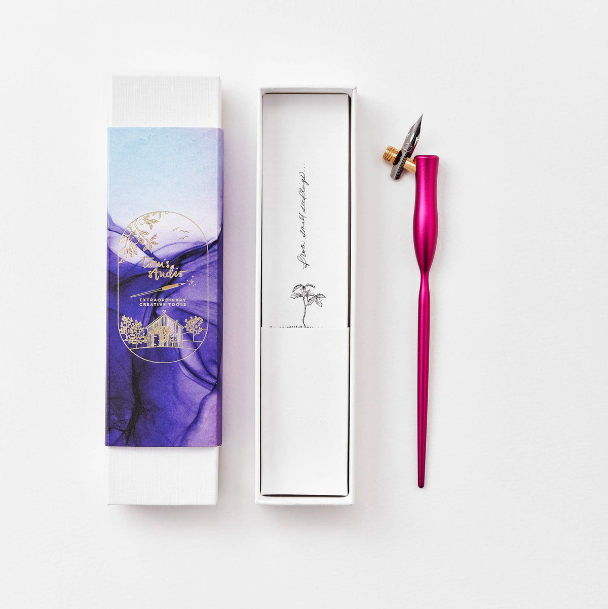 Rose pink flourish calligraphy pen with angled nib and gold accent ring