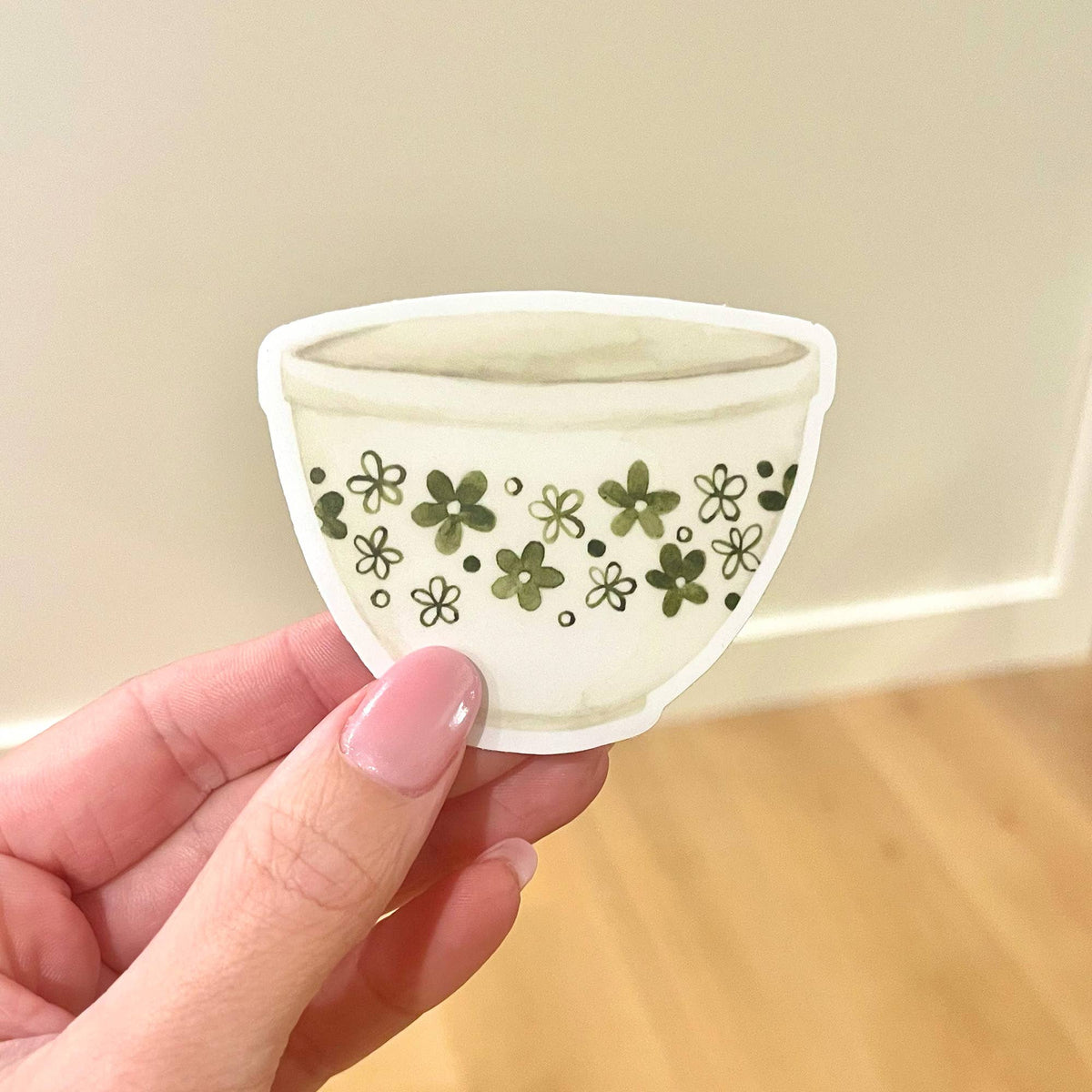 Green daisy floral vinyl waterproof sticker in a teacup shape