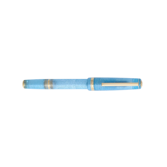 Blue speckled fountain pen with gold barrel rings and capped end