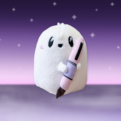 Plush ghost accessory with embroidered face, pink ears, and dangling wand