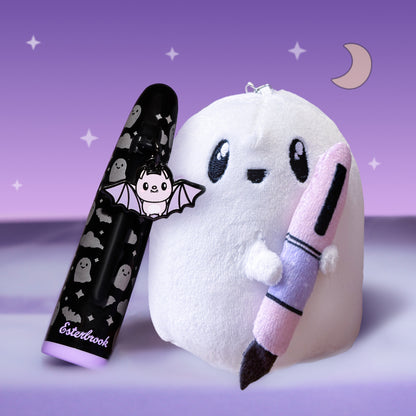 Black decorative fountain pen with plush white character accessory